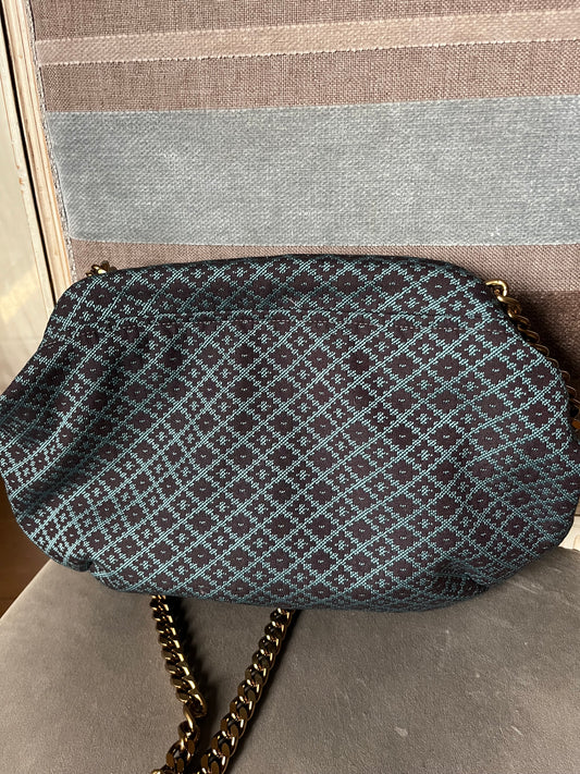 Clutch in tessuto